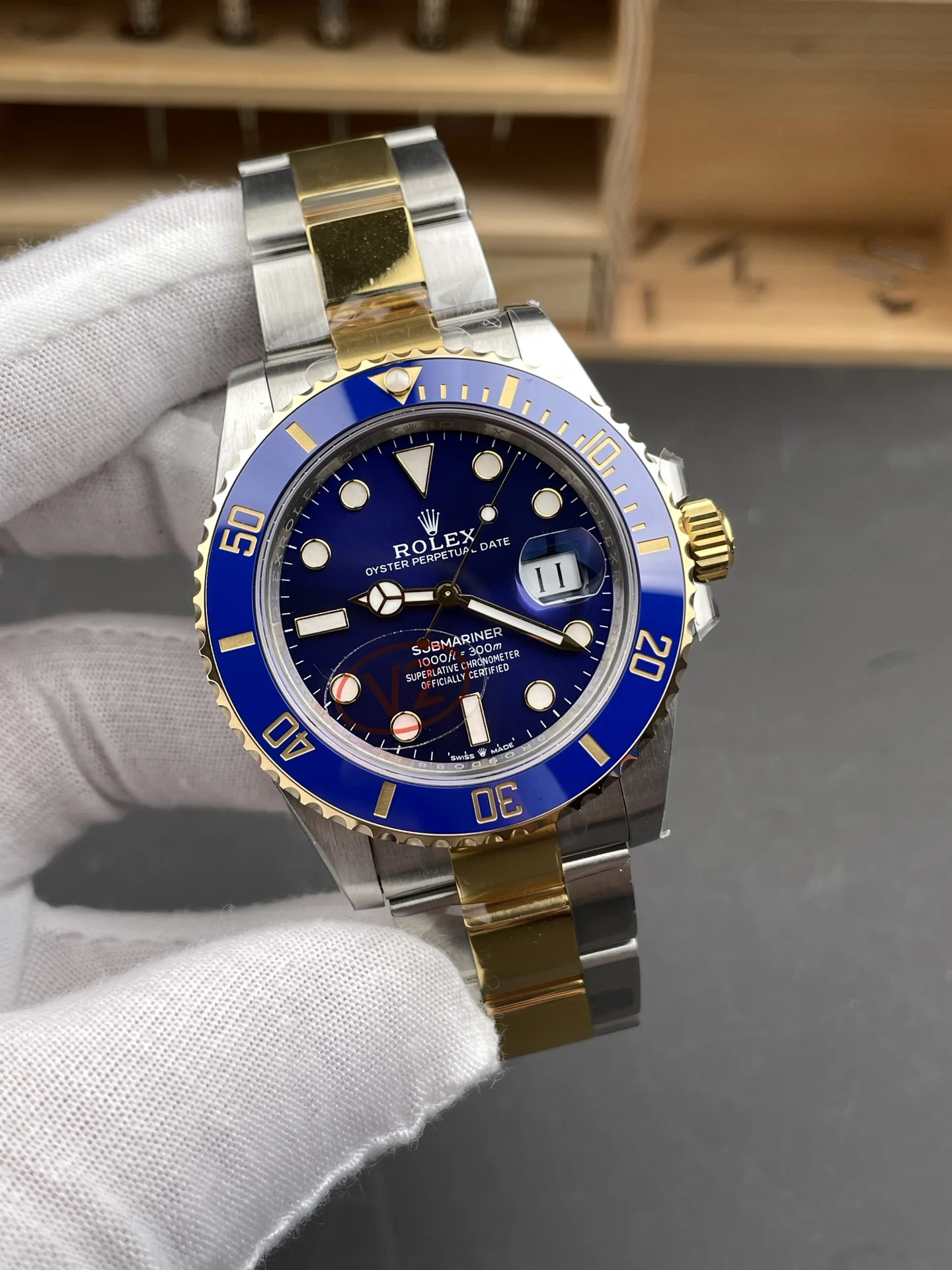 Rolex Submariner Two-Tone Blue Dial 41mm — photographed off the sweep