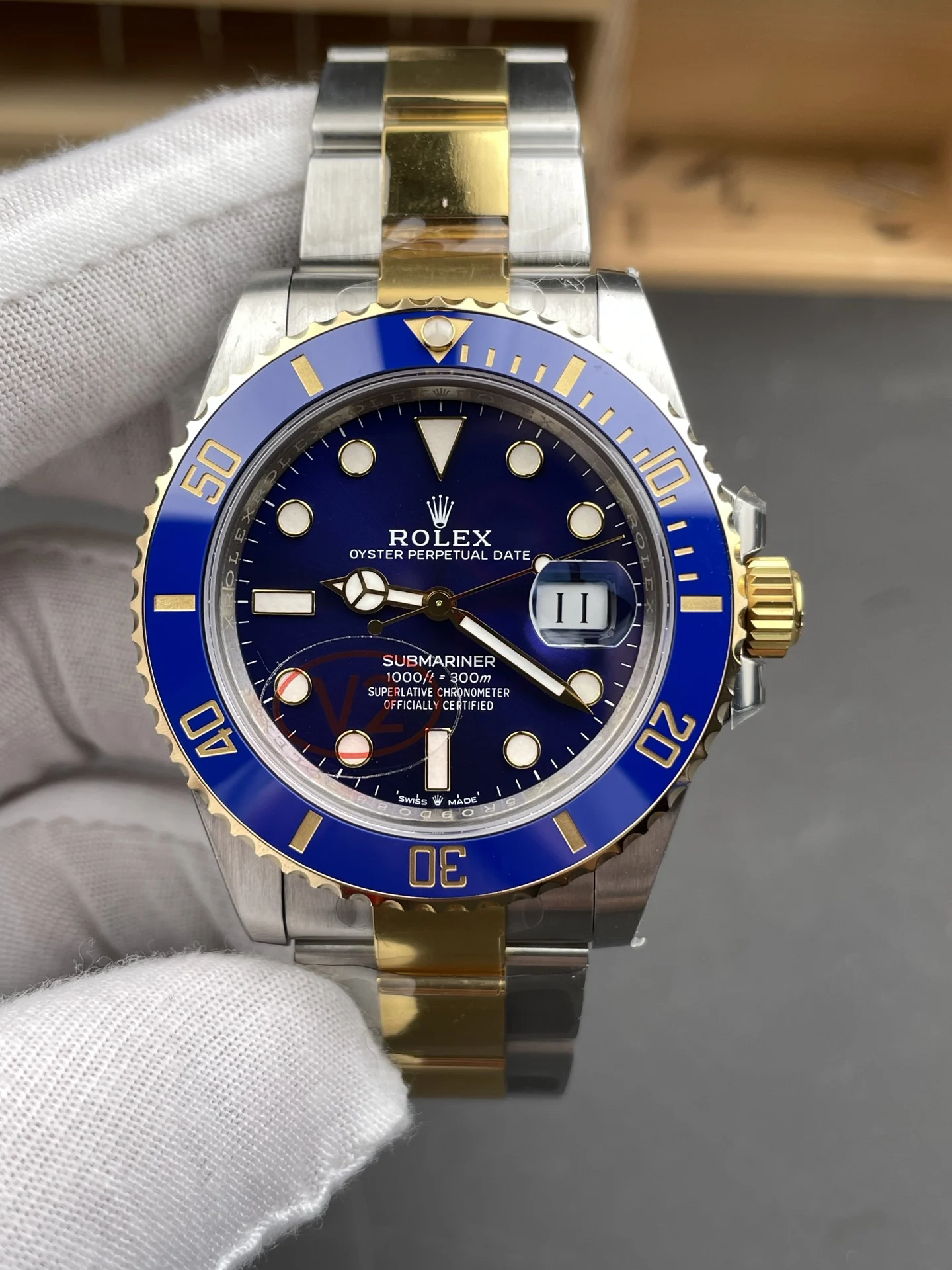 Rolex Submariner Two-Tone Blue Dial 41mm — photographed off the sweep