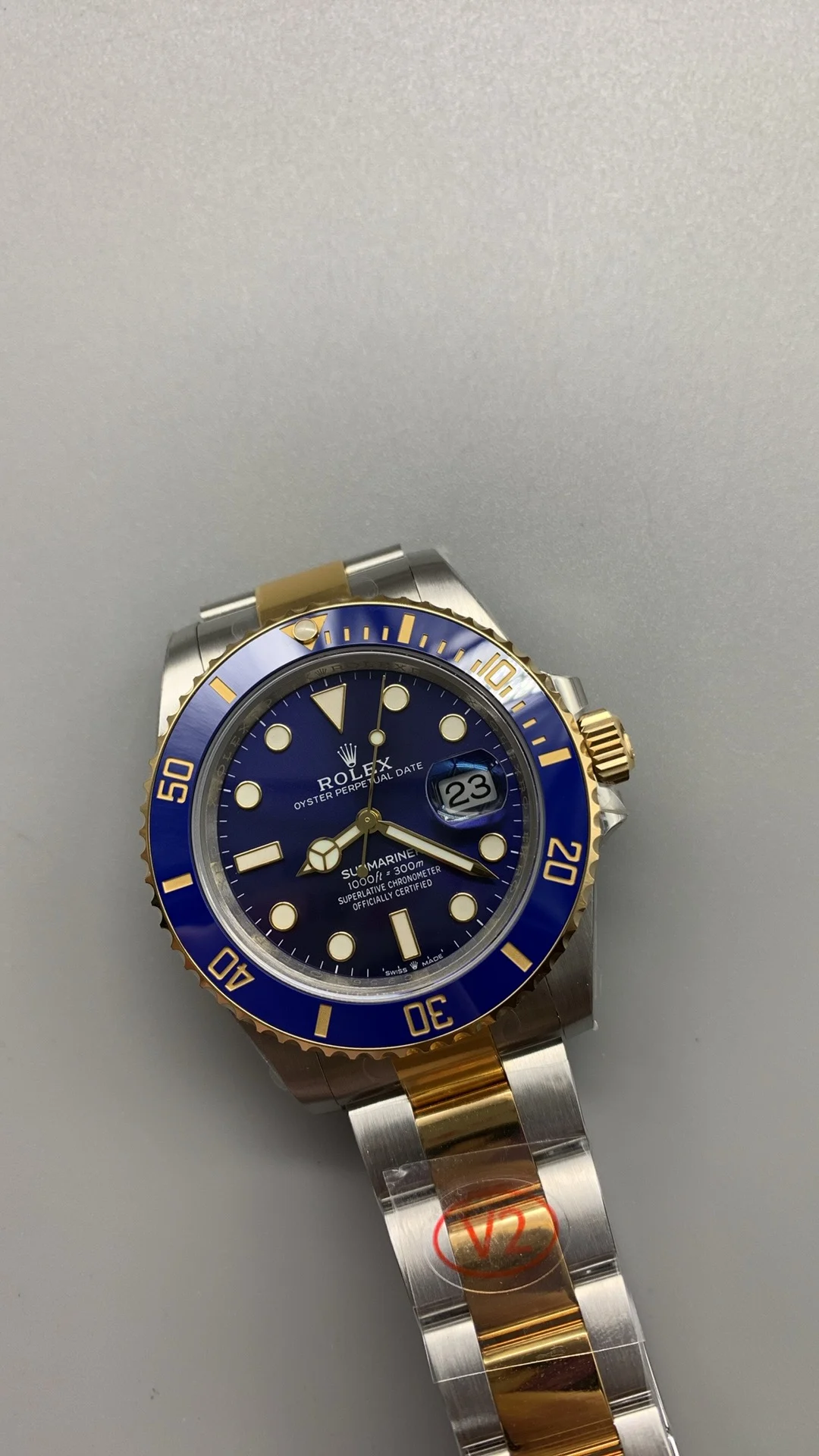 Rolex Submariner Two-Tone Blue Dial 41mm — photographed off the sweep