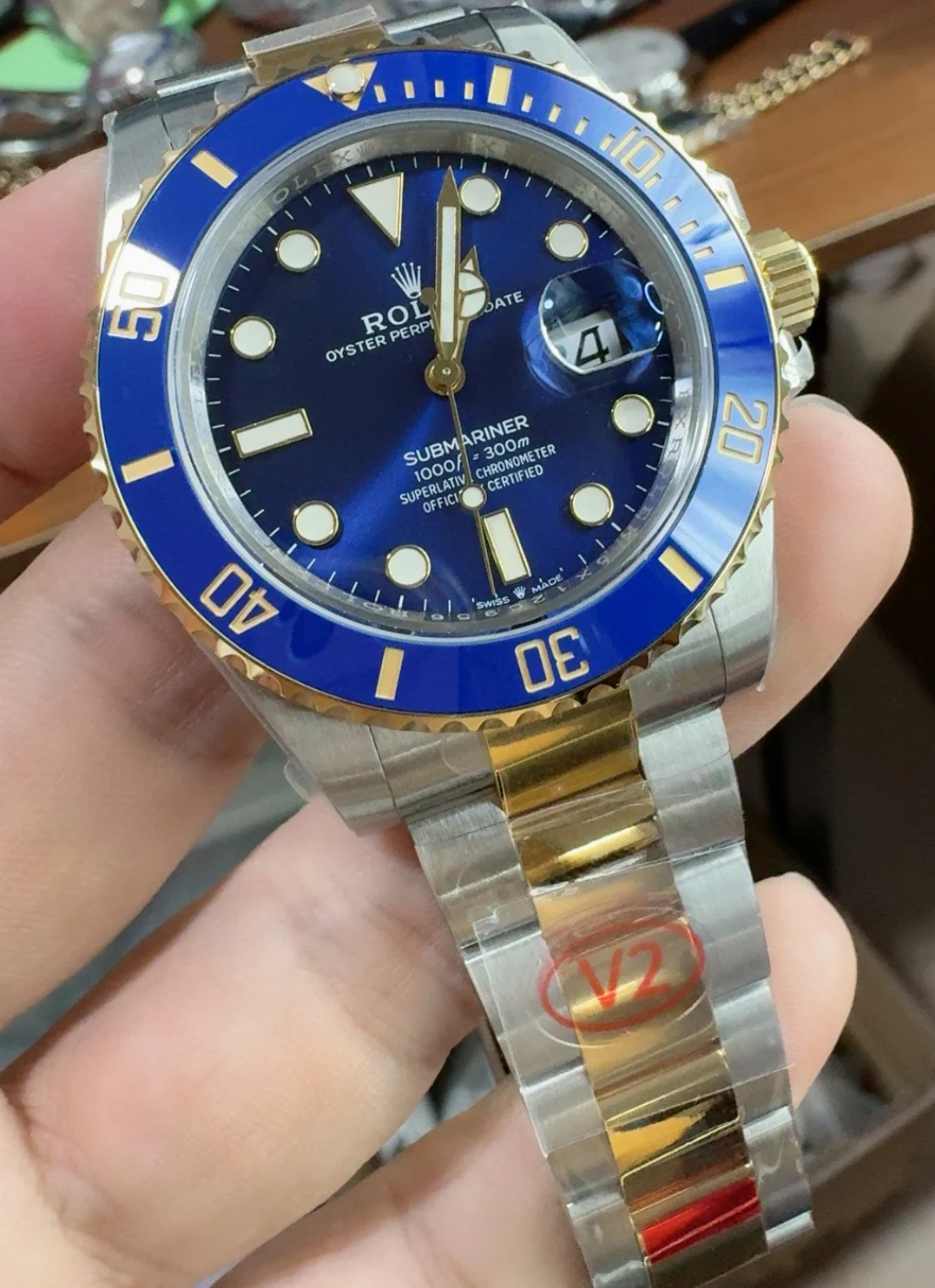 Rolex Submariner Two-Tone Blue Dial 41mm — photographed off the sweep