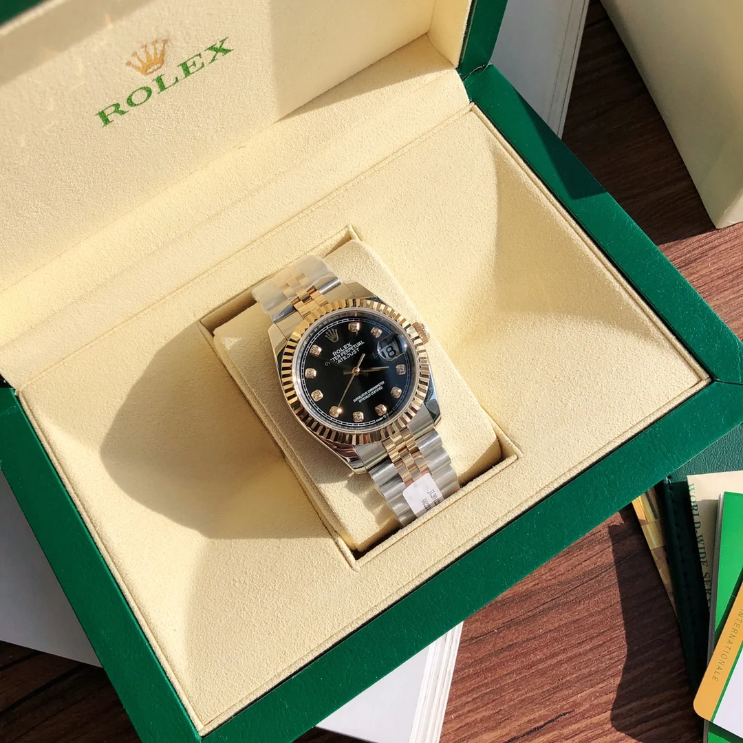 Rolex Submariner Yellow Gold 36mm — photographed off the sweep