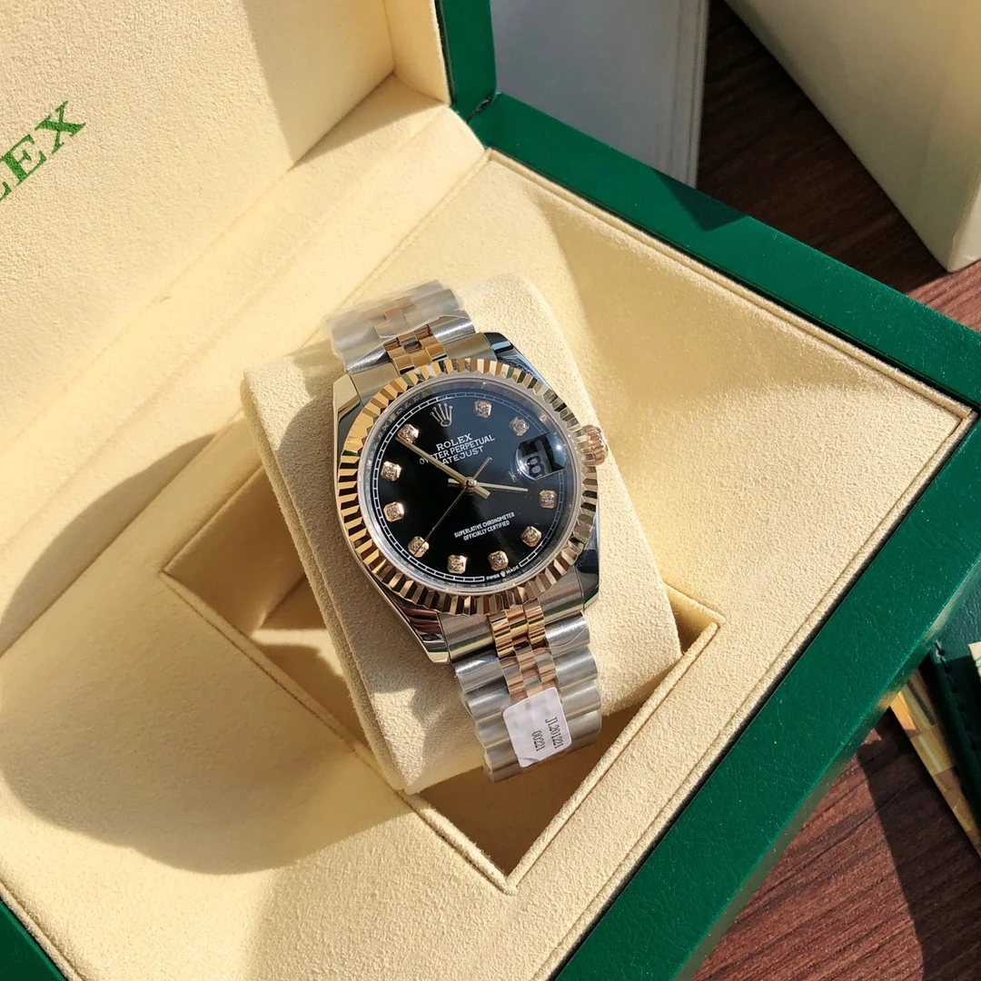Rolex Submariner Yellow Gold 36mm — photographed off the sweep