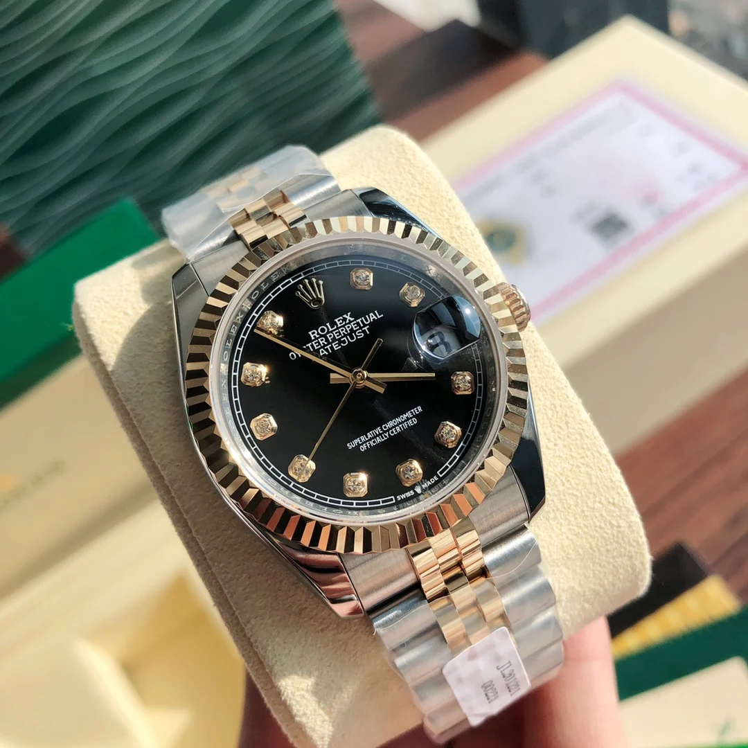 Rolex Submariner Yellow Gold 36mm — photographed off the sweep