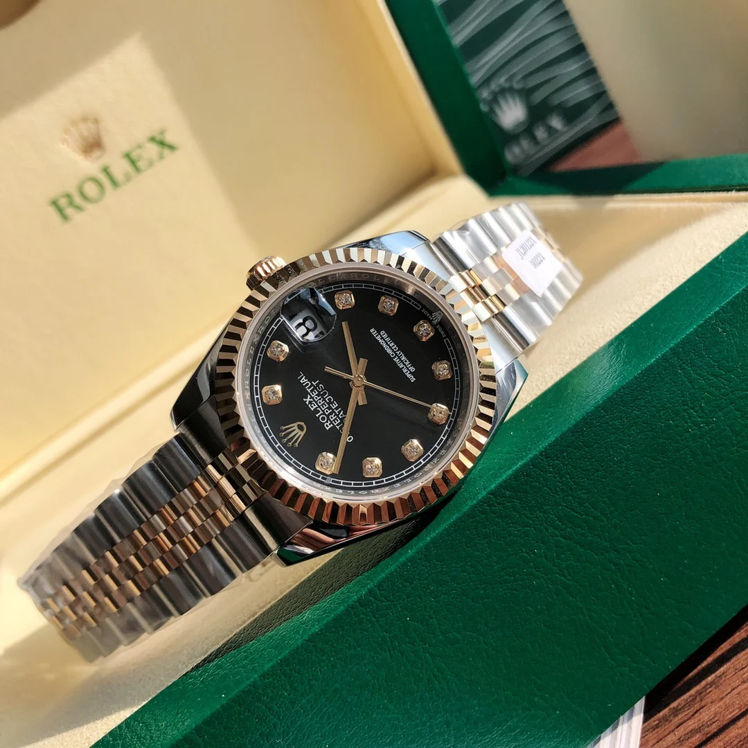 Rolex Submariner Yellow Gold 36mm — photographed off the sweep