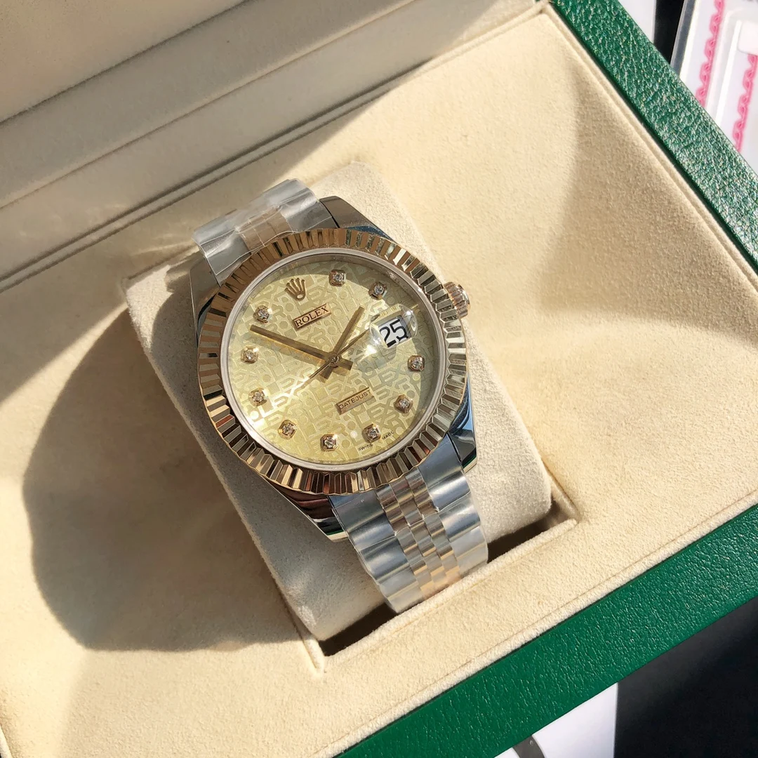 Rolex Submariner Yellow Gold 41mm — photographed off the sweep