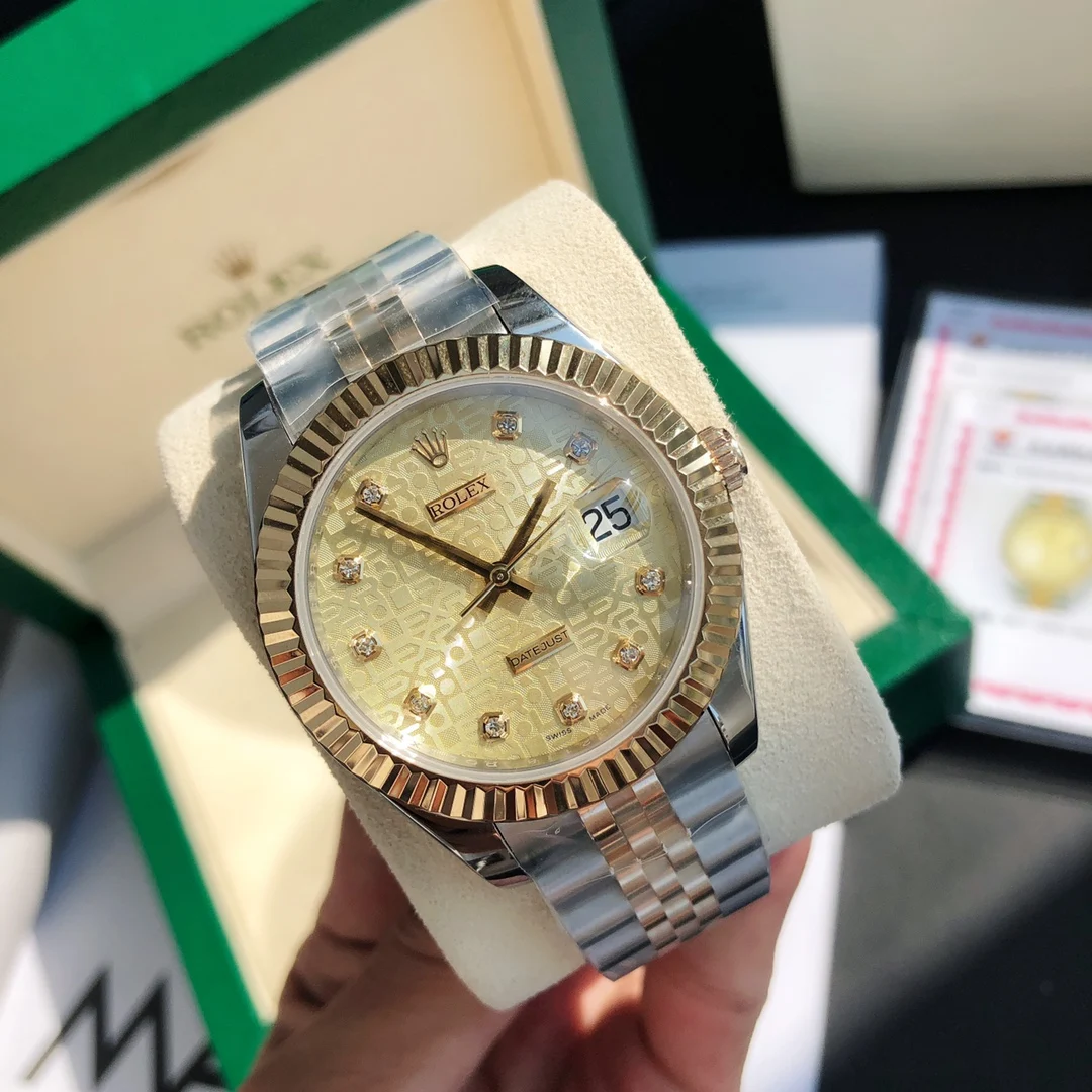 Rolex Submariner Yellow Gold 41mm — photographed off the sweep