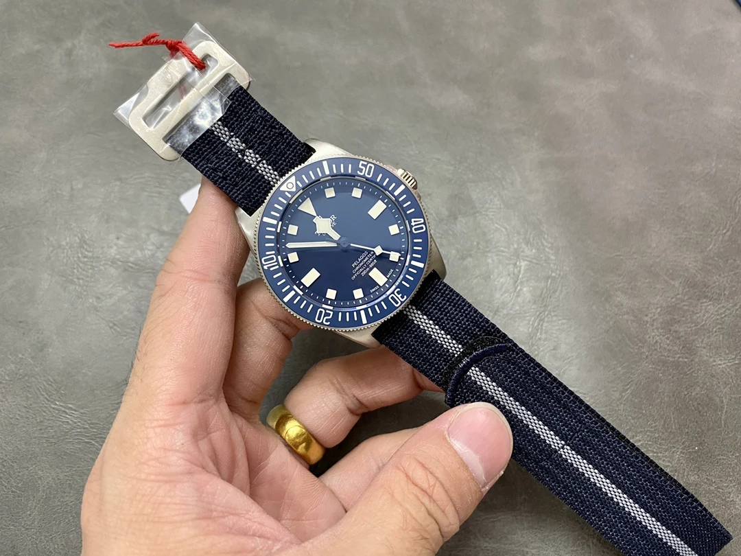Rolex Titanium Blue Dial 42mm — photographed off the sweep