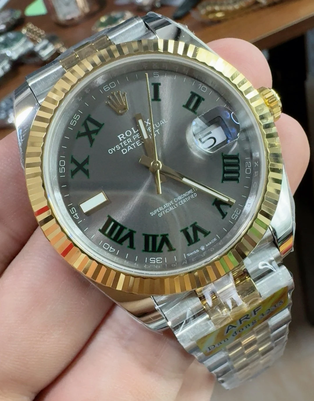Rolex Two-Tone Green Dial 41mm — photographed off the sweep