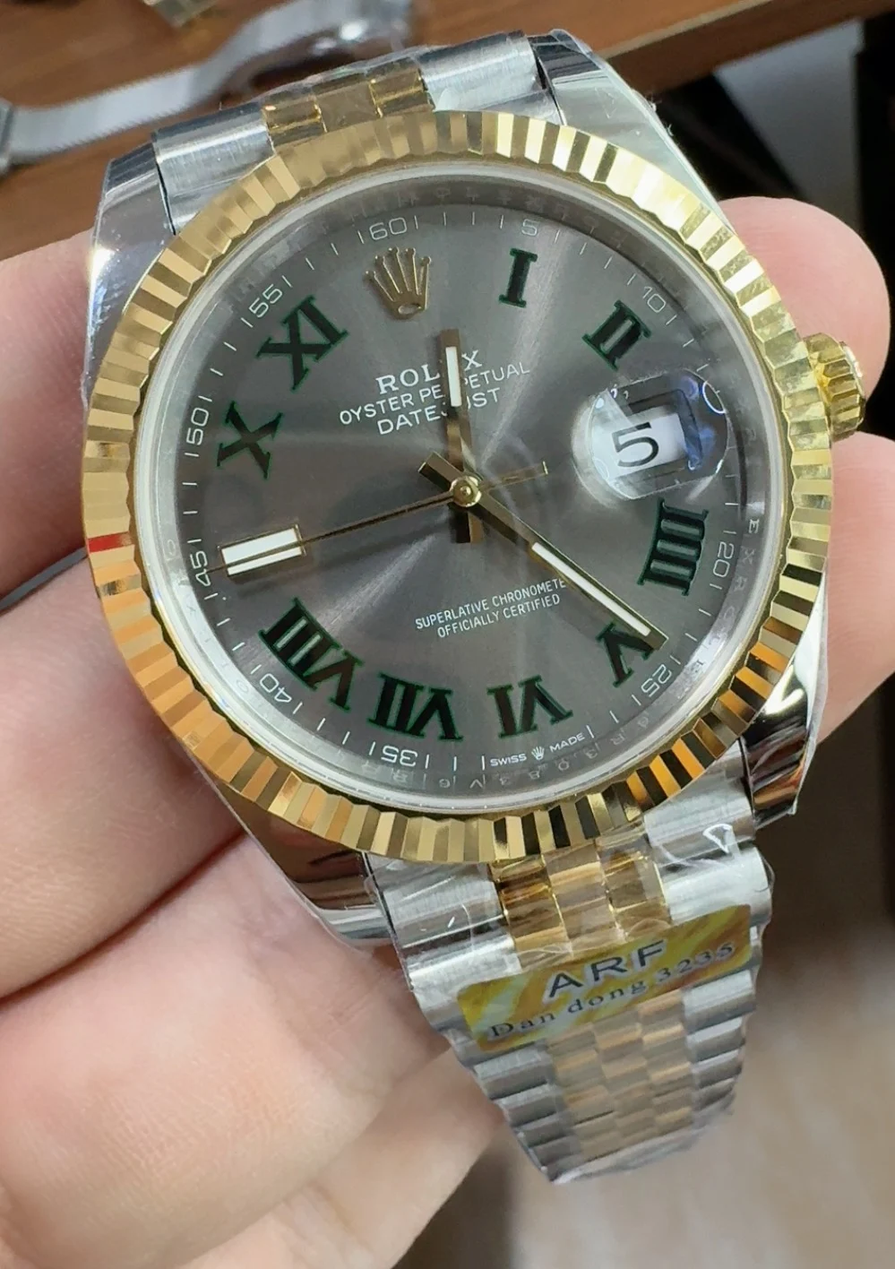 Rolex Two-Tone Green Dial 41mm — photographed off the sweep
