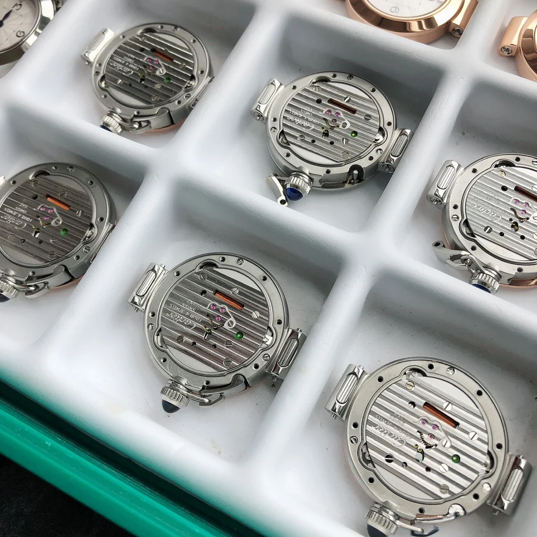Rose gold case, screw-in crown, sapphire-set crown, pearlescent — photographed off the sweep