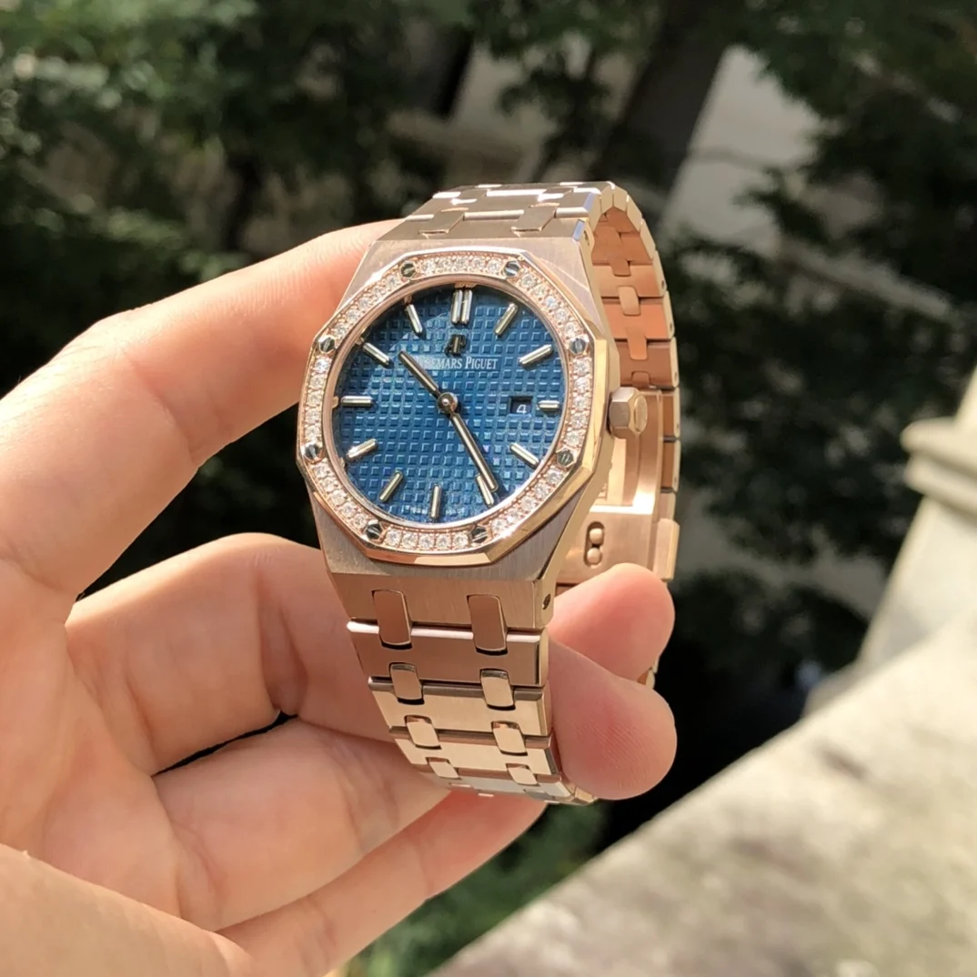 Rose gold, dark blue dial
