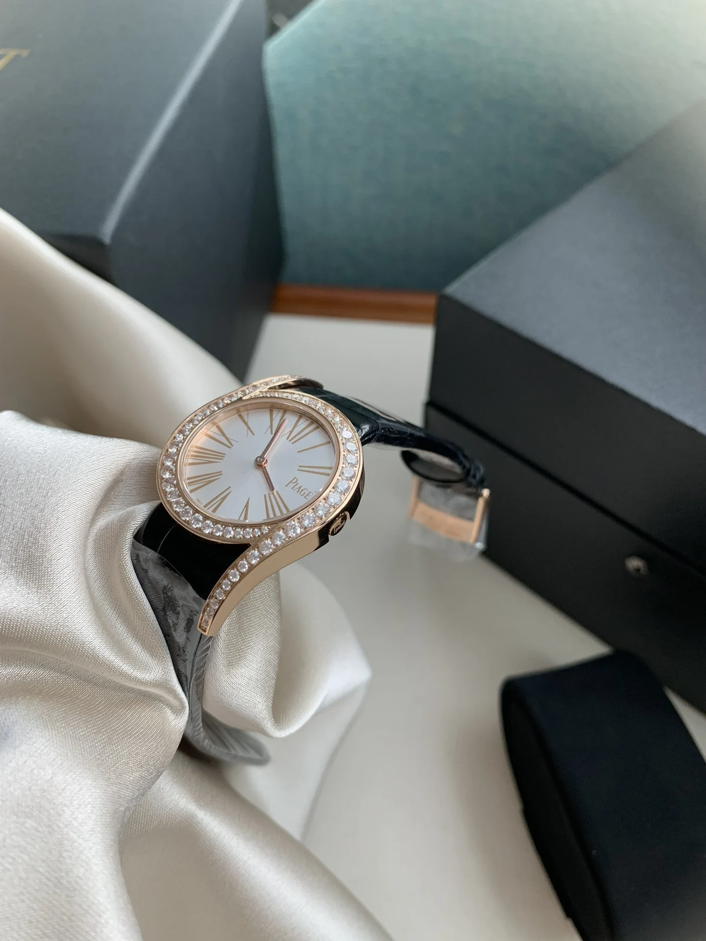Rose gold Roman lettering, understated luxury and elegance — photographed off the sweep