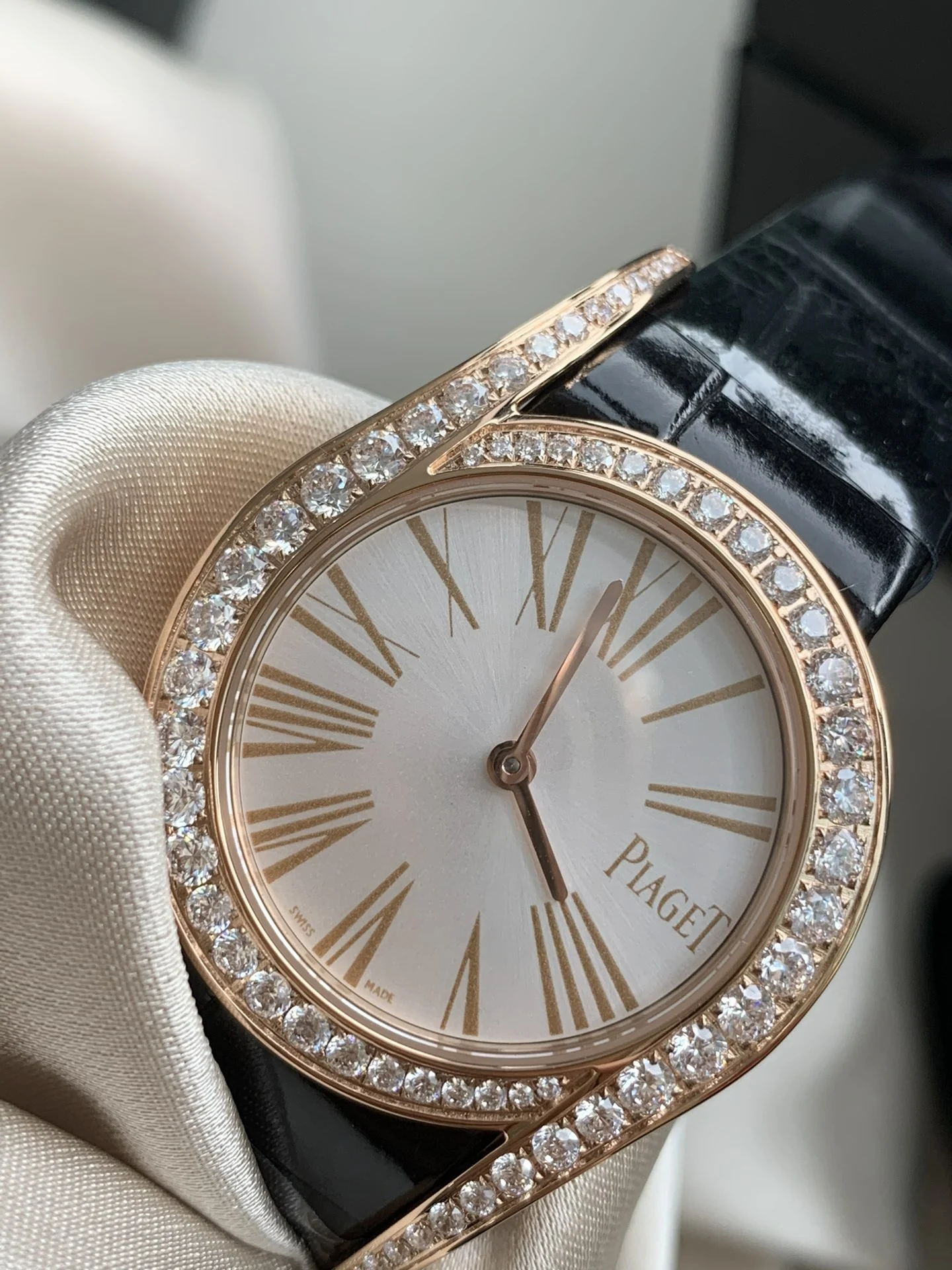 Rose gold Roman lettering, understated luxury and elegance — photographed off the sweep