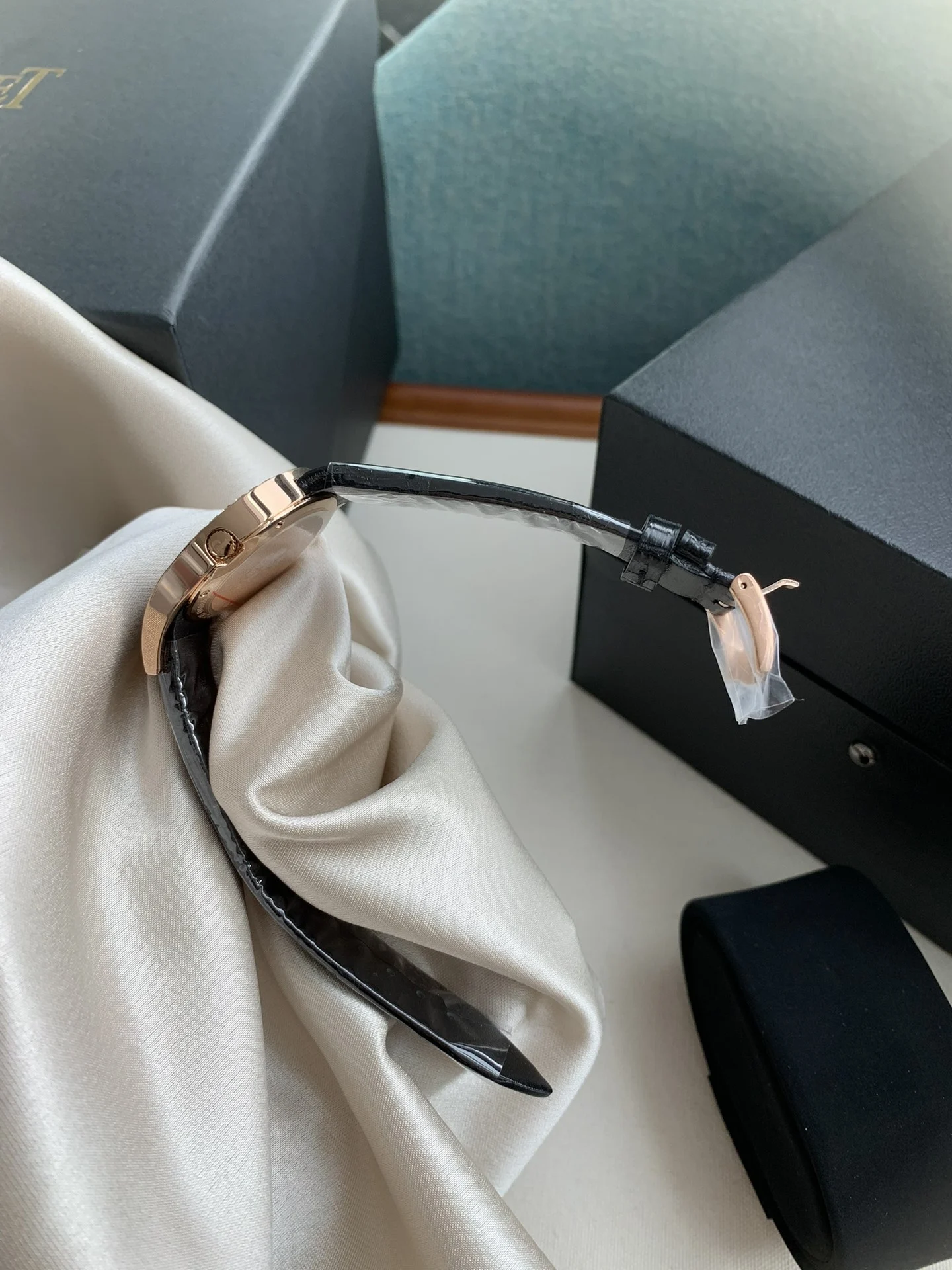 Rose gold Roman lettering, understated luxury and elegance — photographed off the sweep