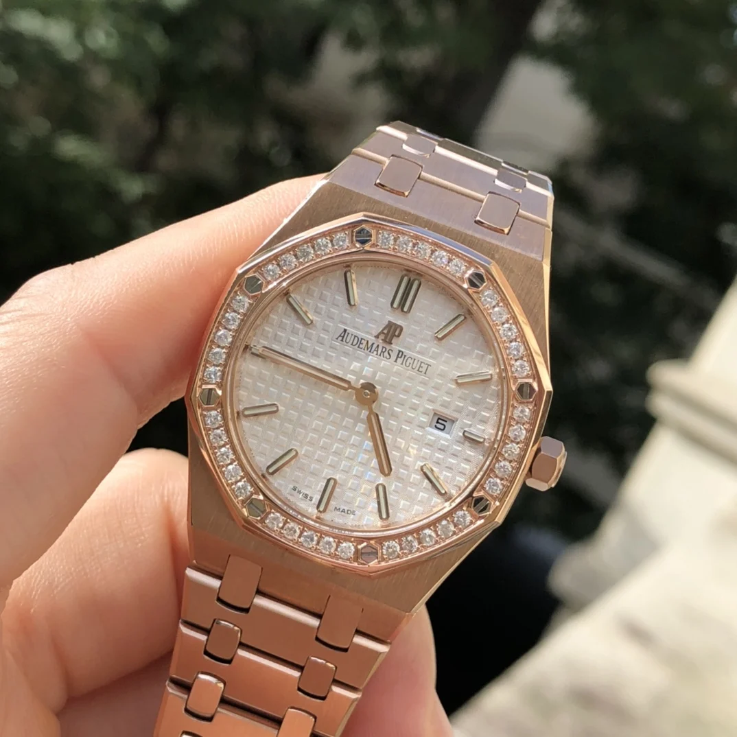 Rose gold white dial — photographed off the sweep