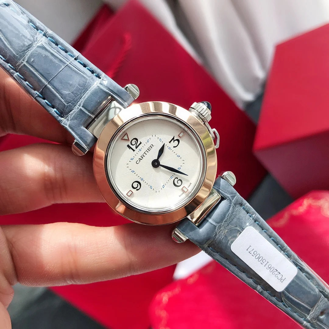 Style 3 Blue two-tone steel and gold — photographed off the sweep