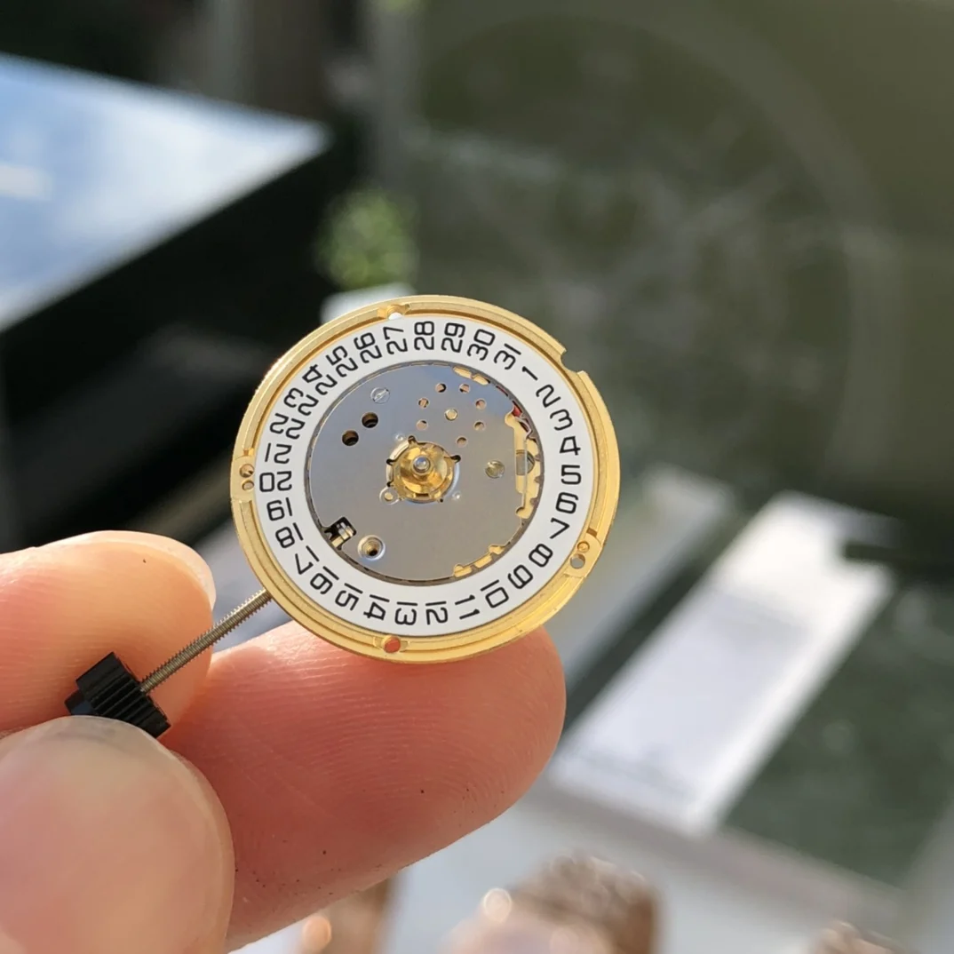 Swiss-made Quartz movement — photographed off the sweep