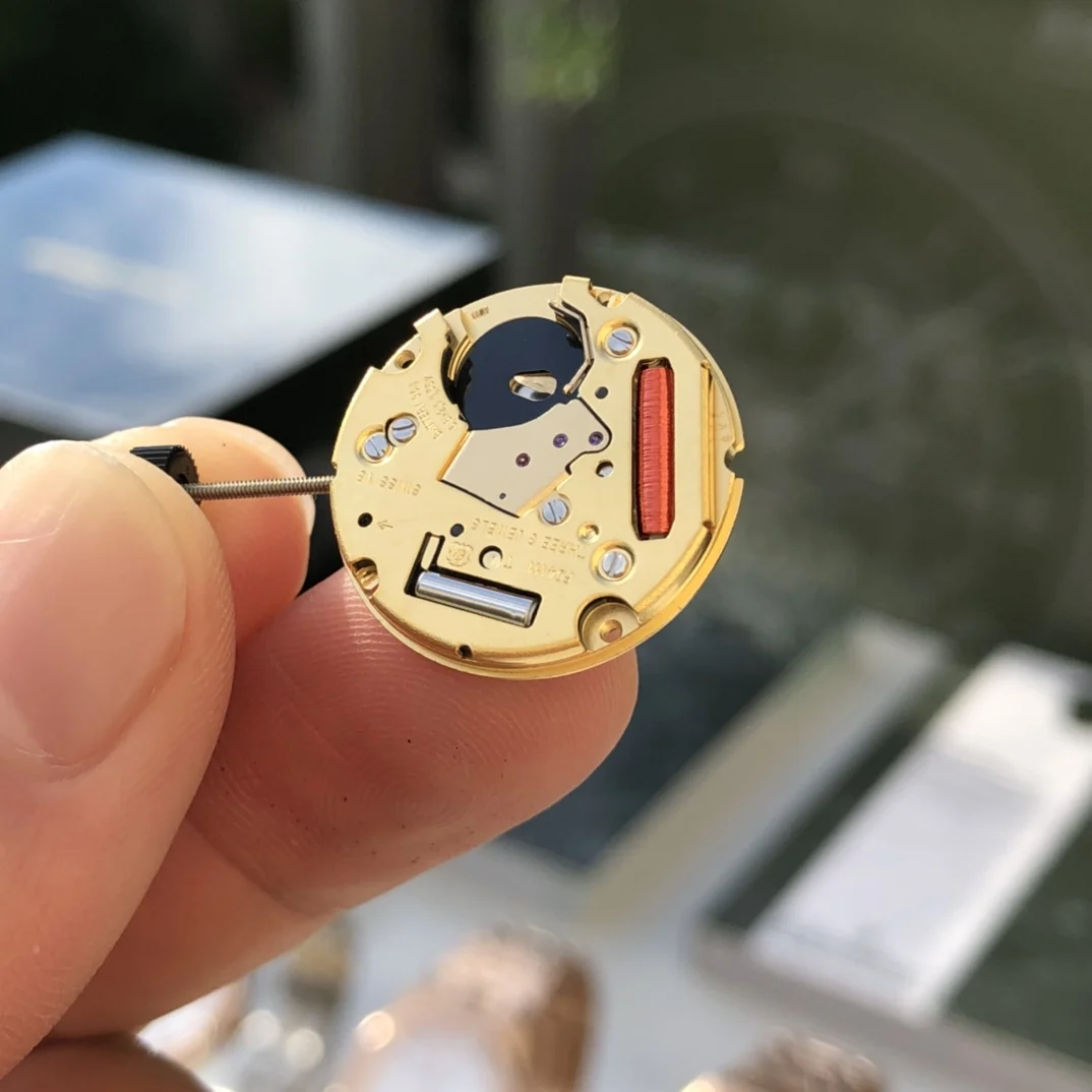 Swiss-made Quartz movement — photographed off the sweep