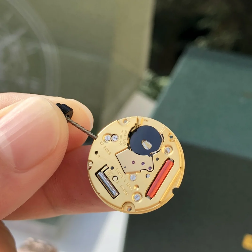 Swiss-made Quartz movement — photographed off the sweep