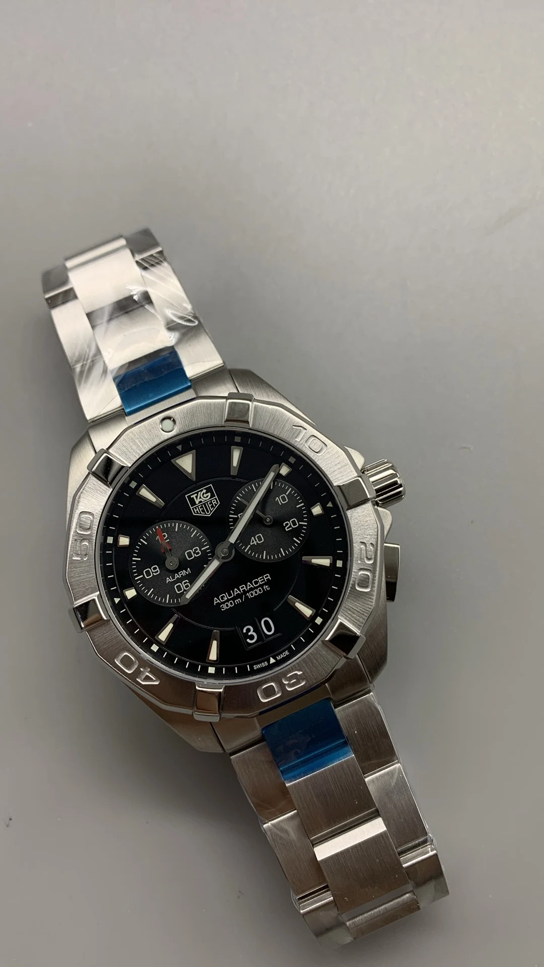 TAG Heuer quartz, alarm clock , quartz — photographed off the sweep