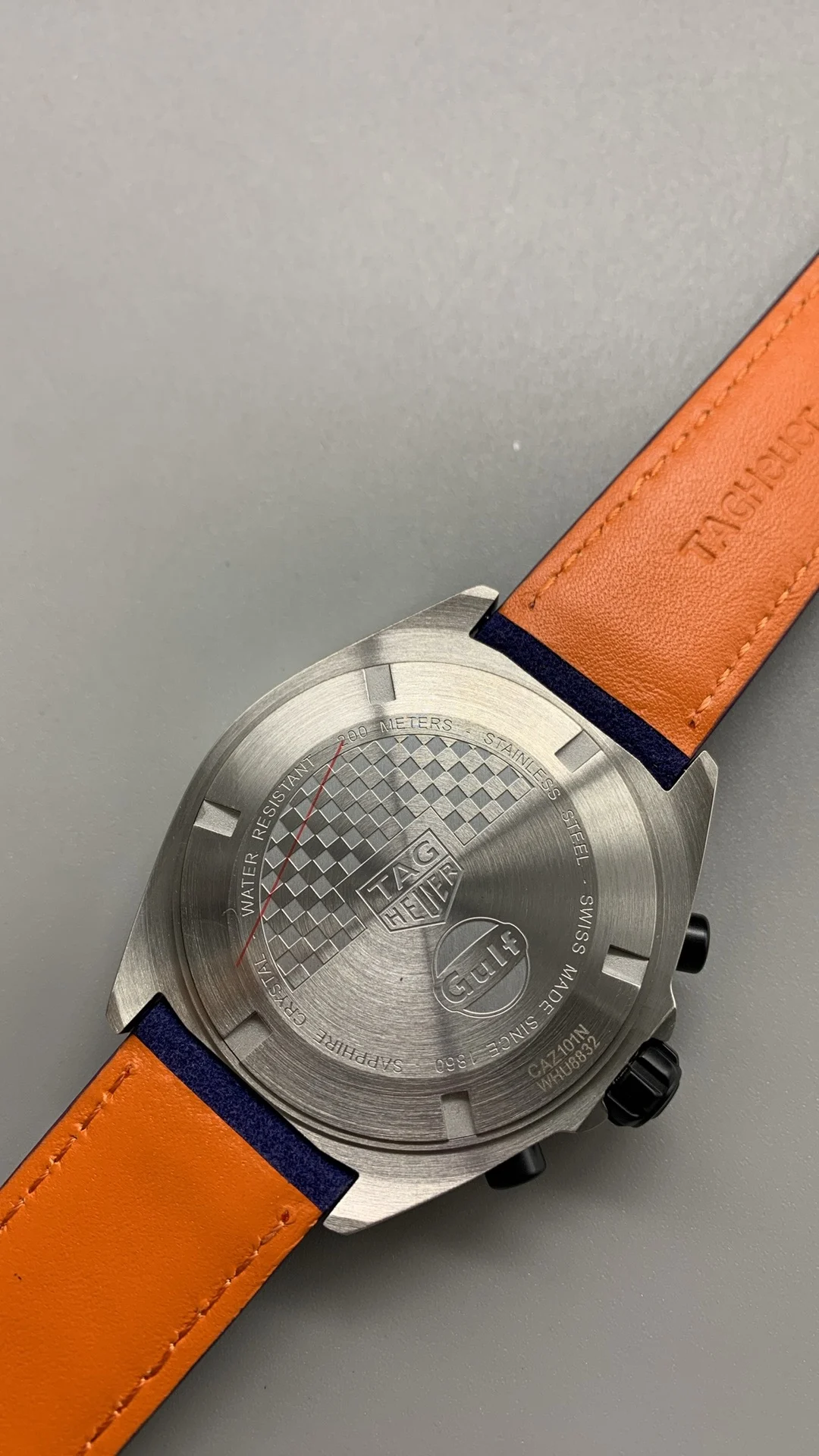 TAG Heuer racing car, quartz time trial — photographed off the sweep