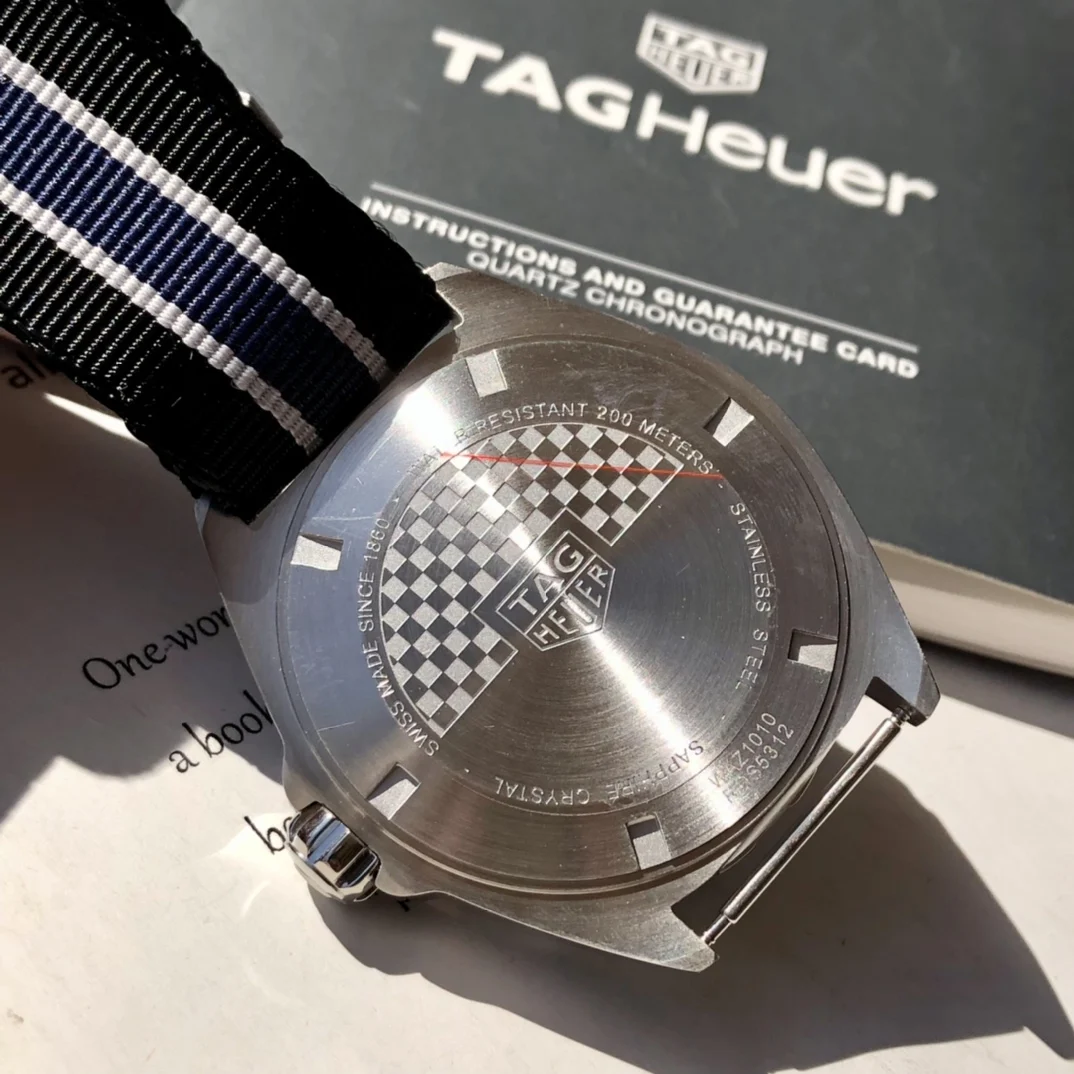 TAG Heuer Steel 41mm — photographed off the sweep