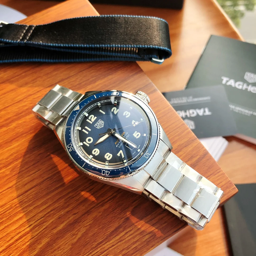 TAG Heuer Steel 42mm — photographed off the sweep
