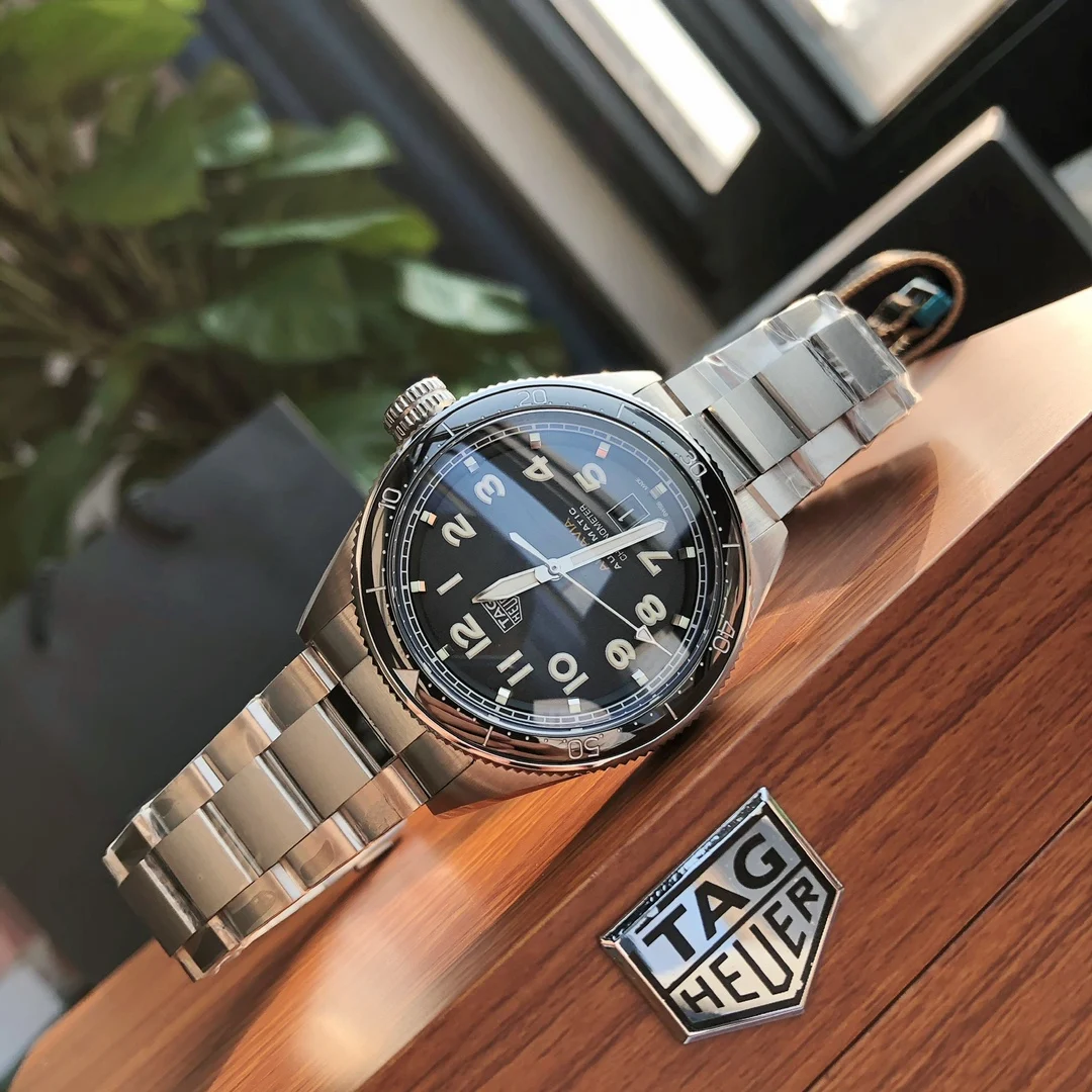 TAG Heuer Steel 42mm — photographed off the sweep