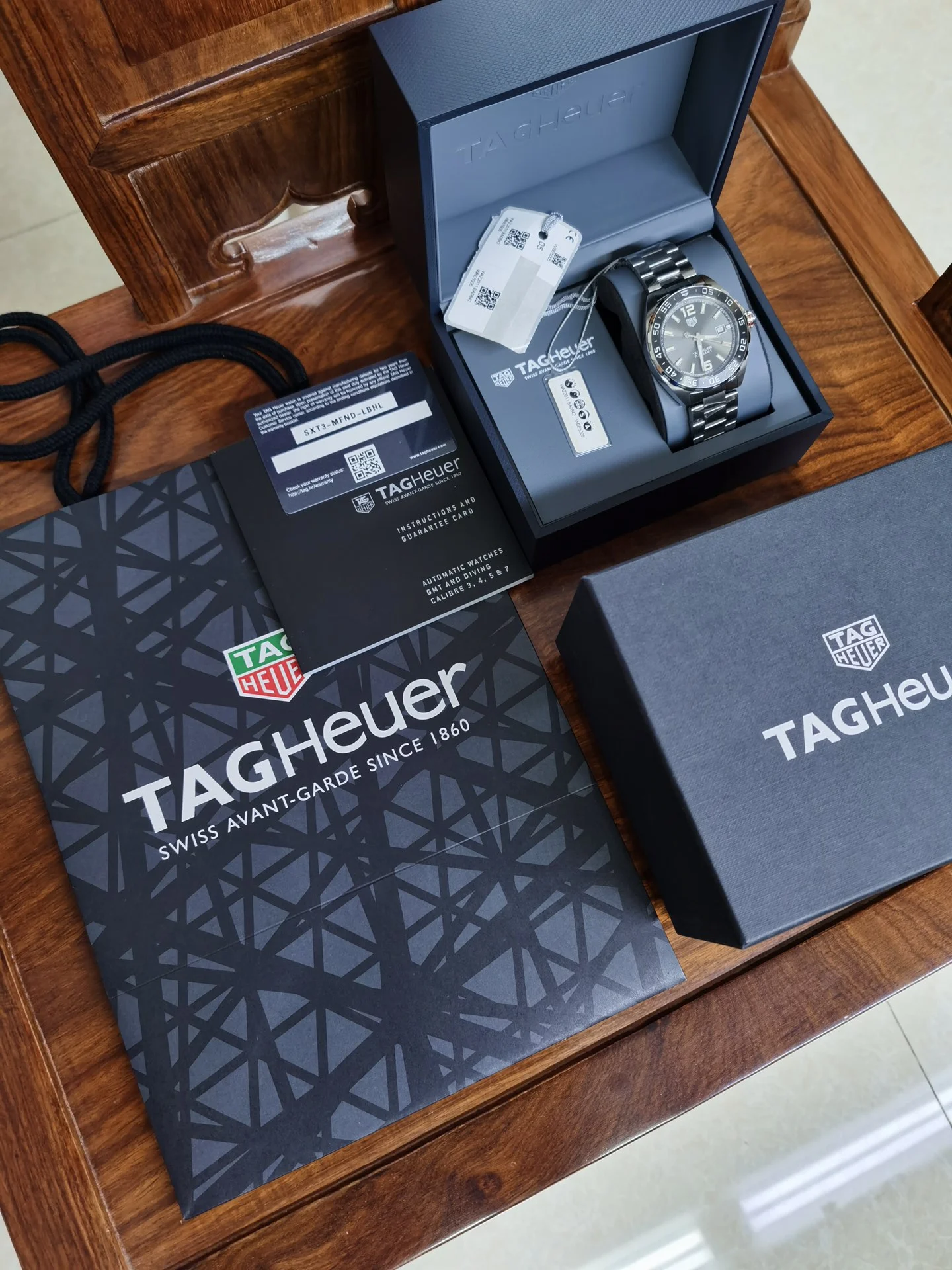 TAG Heuer Steel 43mm — photographed off the sweep
