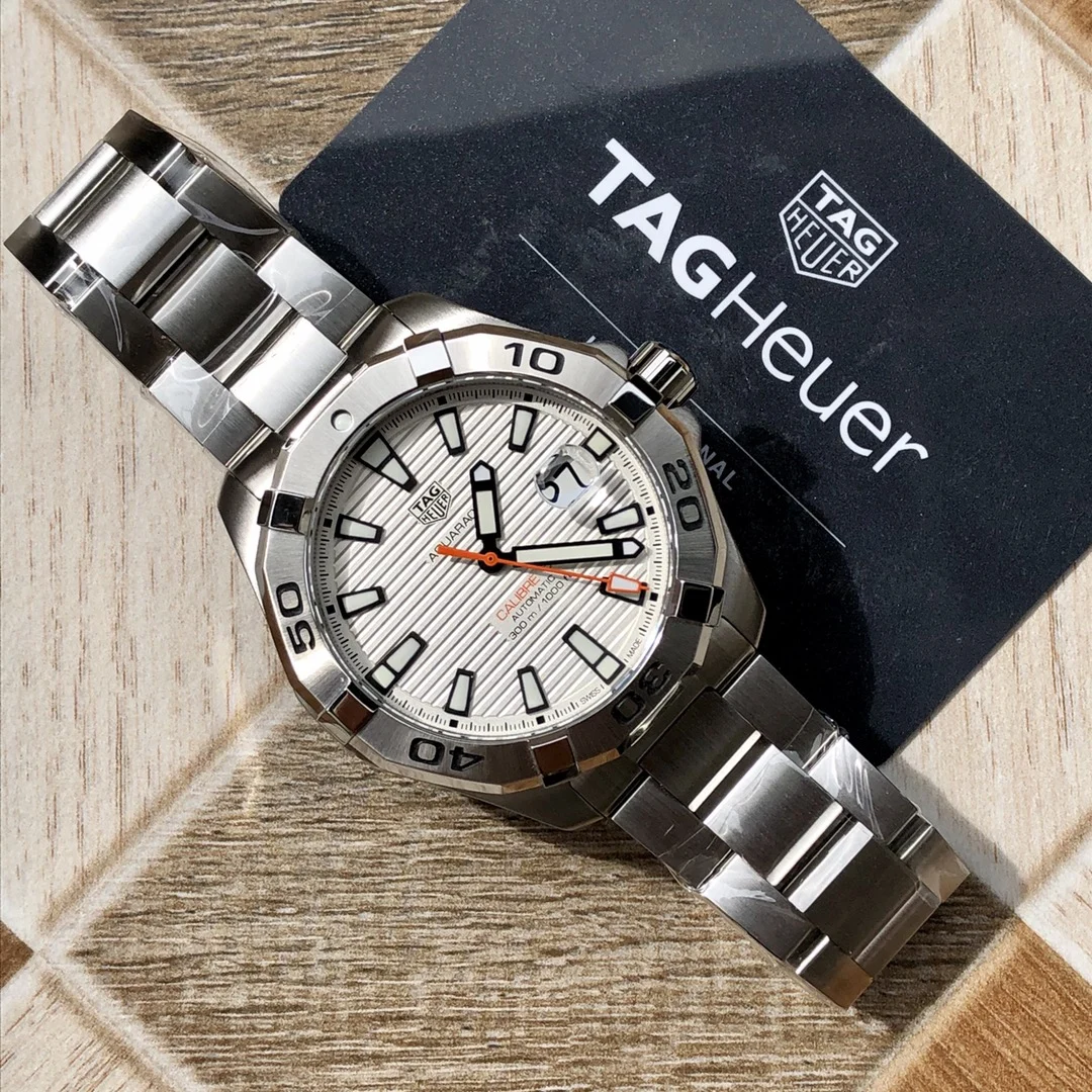 TAG Heuer Steel 43mm — photographed off the sweep