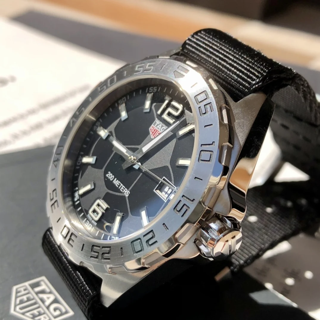 TAG Heuer Steel 43mm — photographed off the sweep
