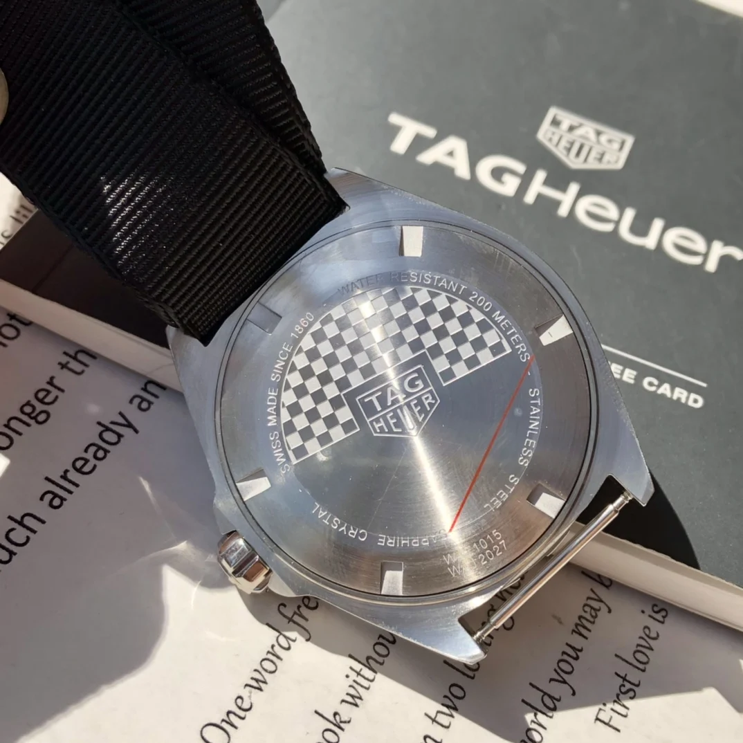 TAG Heuer Steel 43mm — photographed off the sweep
