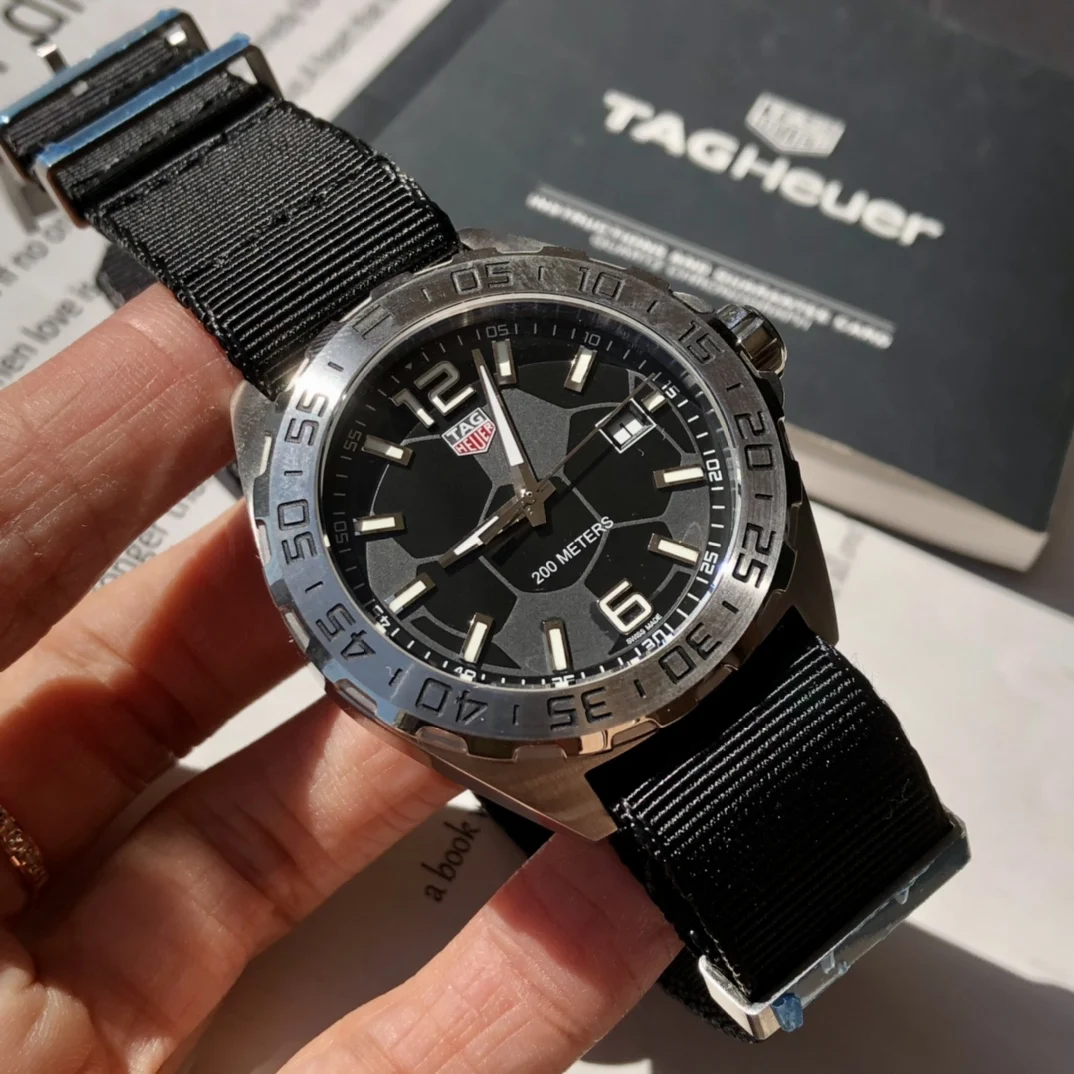 TAG Heuer Steel 43mm — photographed off the sweep
