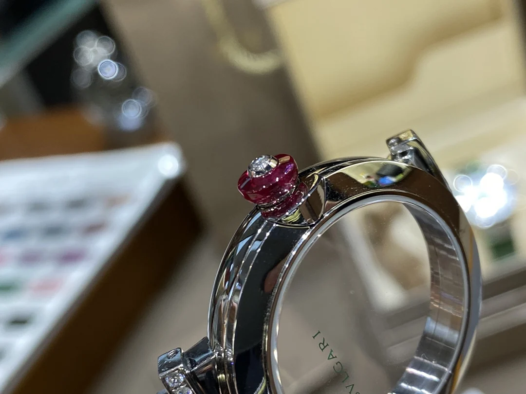 The crown, crafted from rubies and diamonds, is the highlight — photographed off the sweep