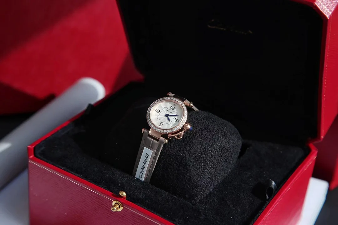 The elegant grey rose gold paired with black Roman numeral hour — photographed off the sweep