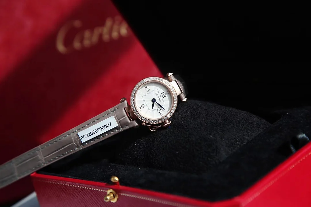 The elegant grey rose gold paired with black Roman numeral hour — photographed off the sweep