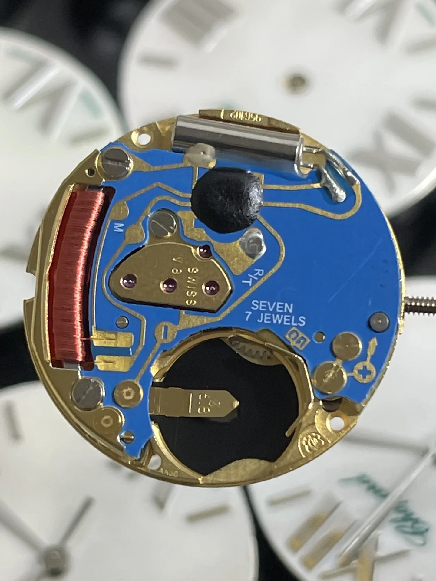The movement uses genuine ETA-956.102 movement parts. Genuine — photographed off the sweep