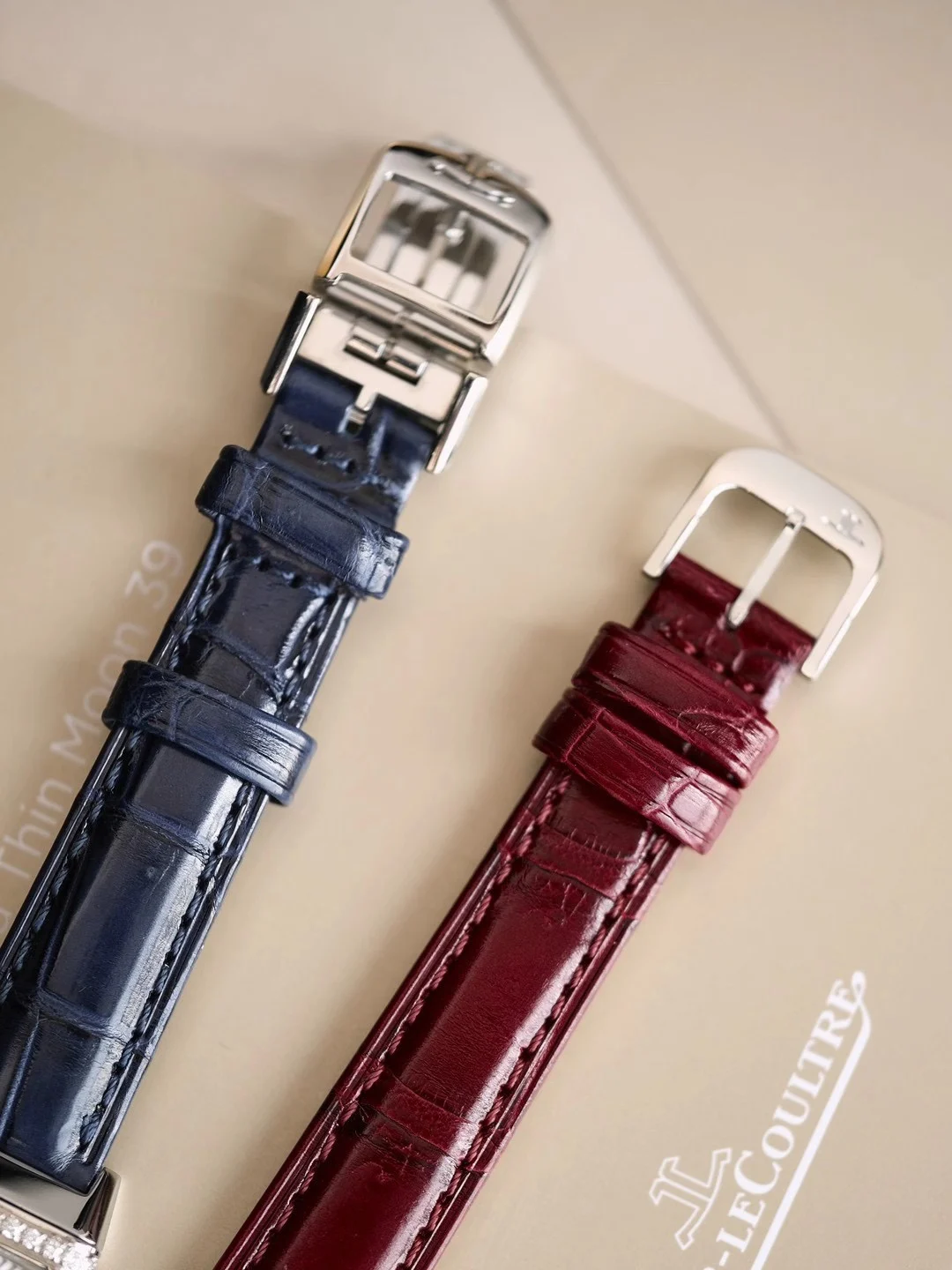 The red and white Claspé dials have different designs, but they