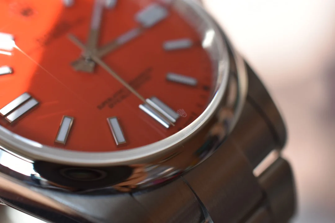 The Rolex logo is engraved on the glass at the 6 o'clock — photographed off the sweep