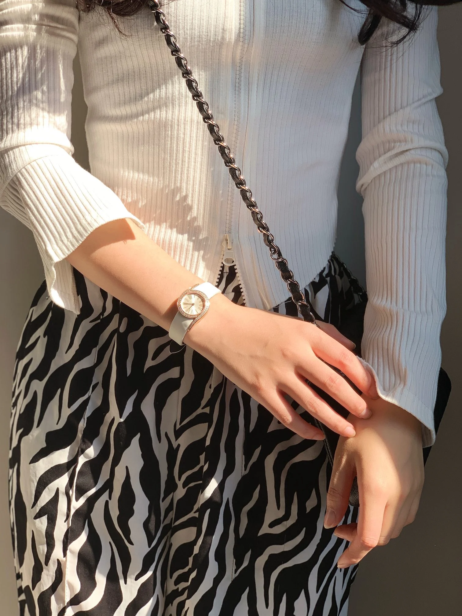 The strap is made of imported silk material, making it more — photographed off the sweep