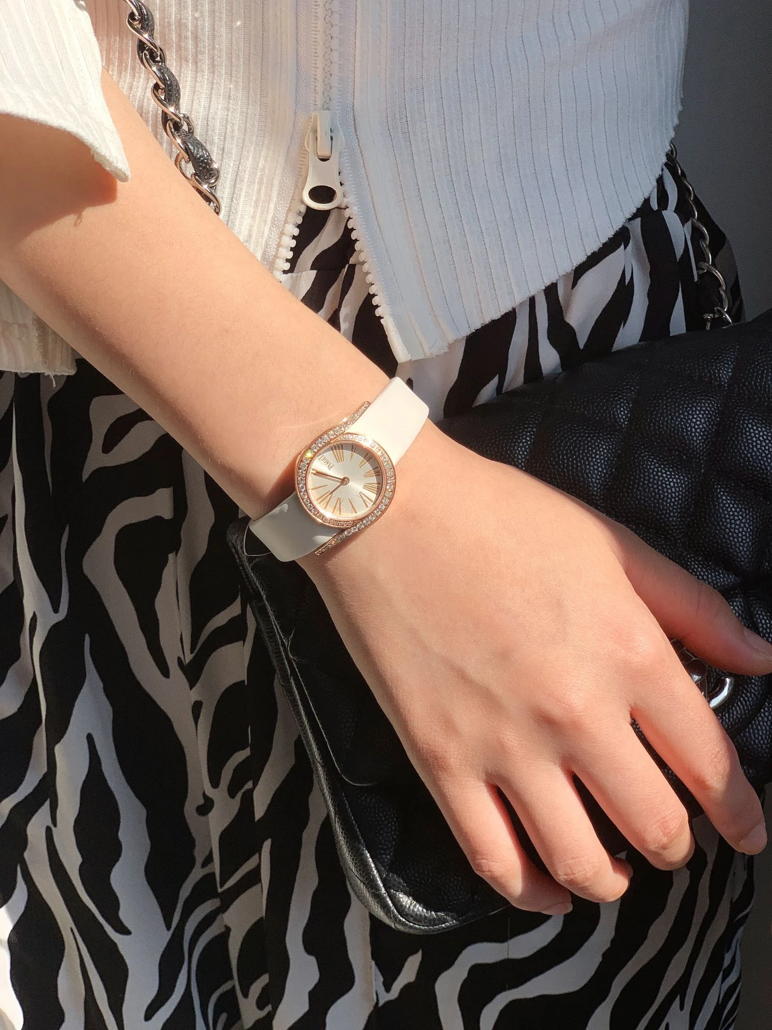 The strap is made of imported silk material, making it more — photographed off the sweep