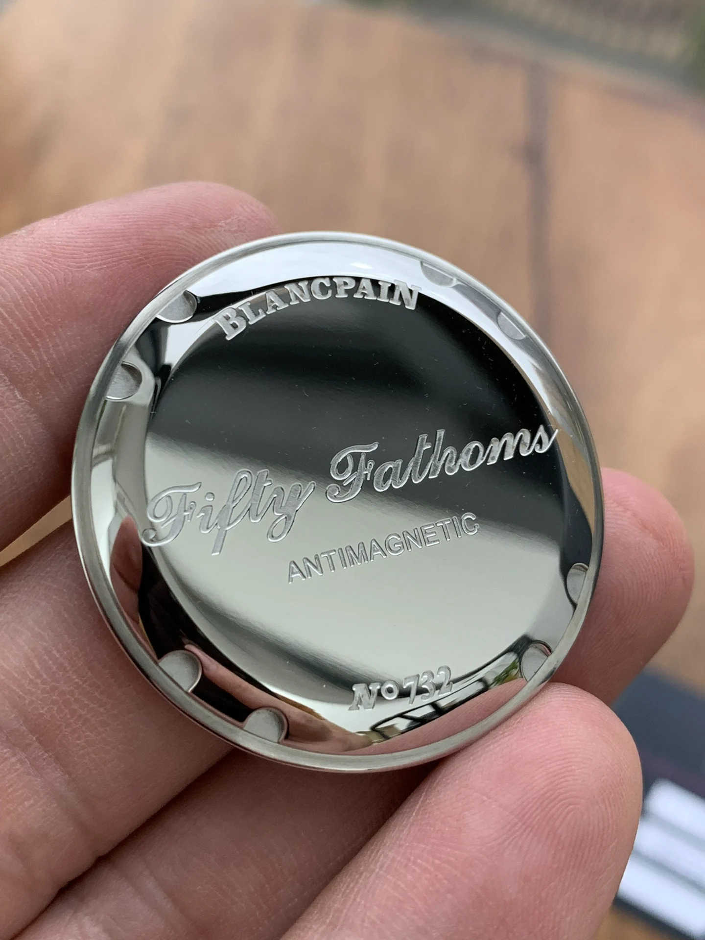 The text on the back cover is made using an etching process