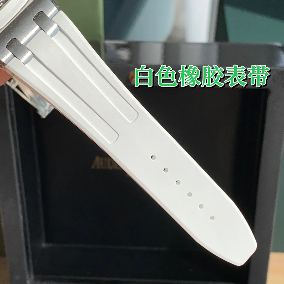 The white liquid silicone strap is paired with a stainless steel