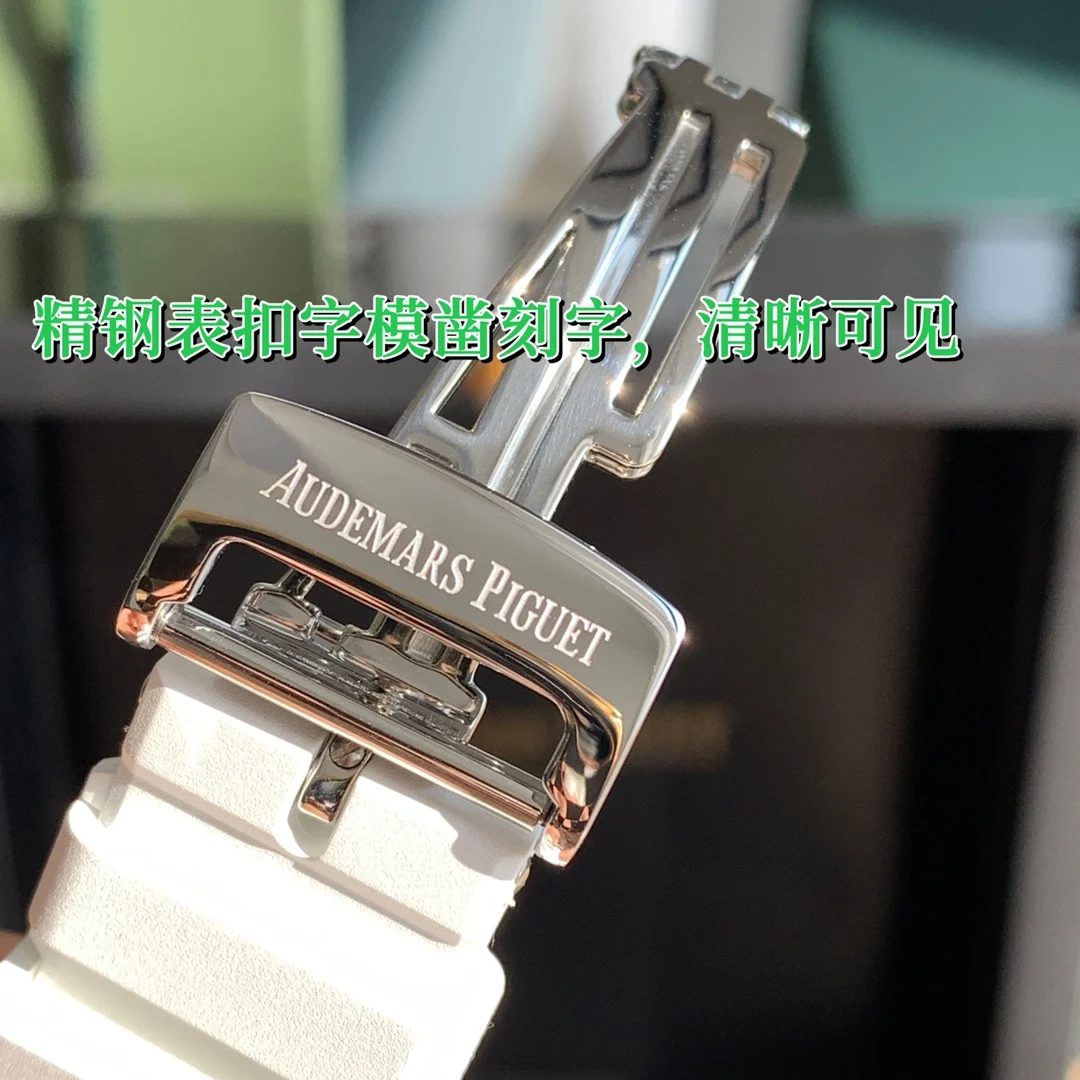 The white liquid silicone strap is paired with a stainless steel — photographed off the sweep