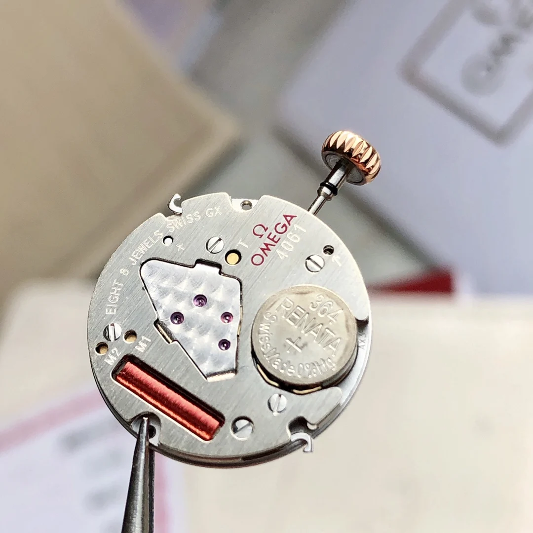 This watch uses a genuine Swiss Omega Cal. 4061 movement, not — photographed off the sweep