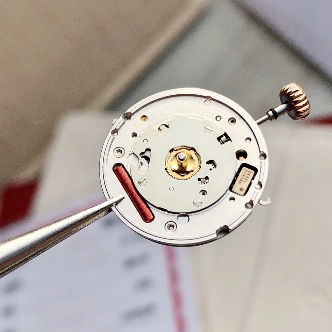This watch uses a genuine Swiss Omega Cal. 4061 movement, not — photographed off the sweep
