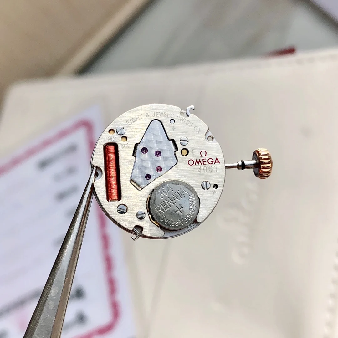 This watch uses a genuine Swiss Omega Cal. 4061 movement, not — photographed off the sweep