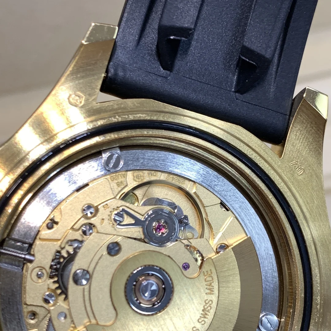 To check the quality of a watch, take it apart and inspect it — photographed off the sweep