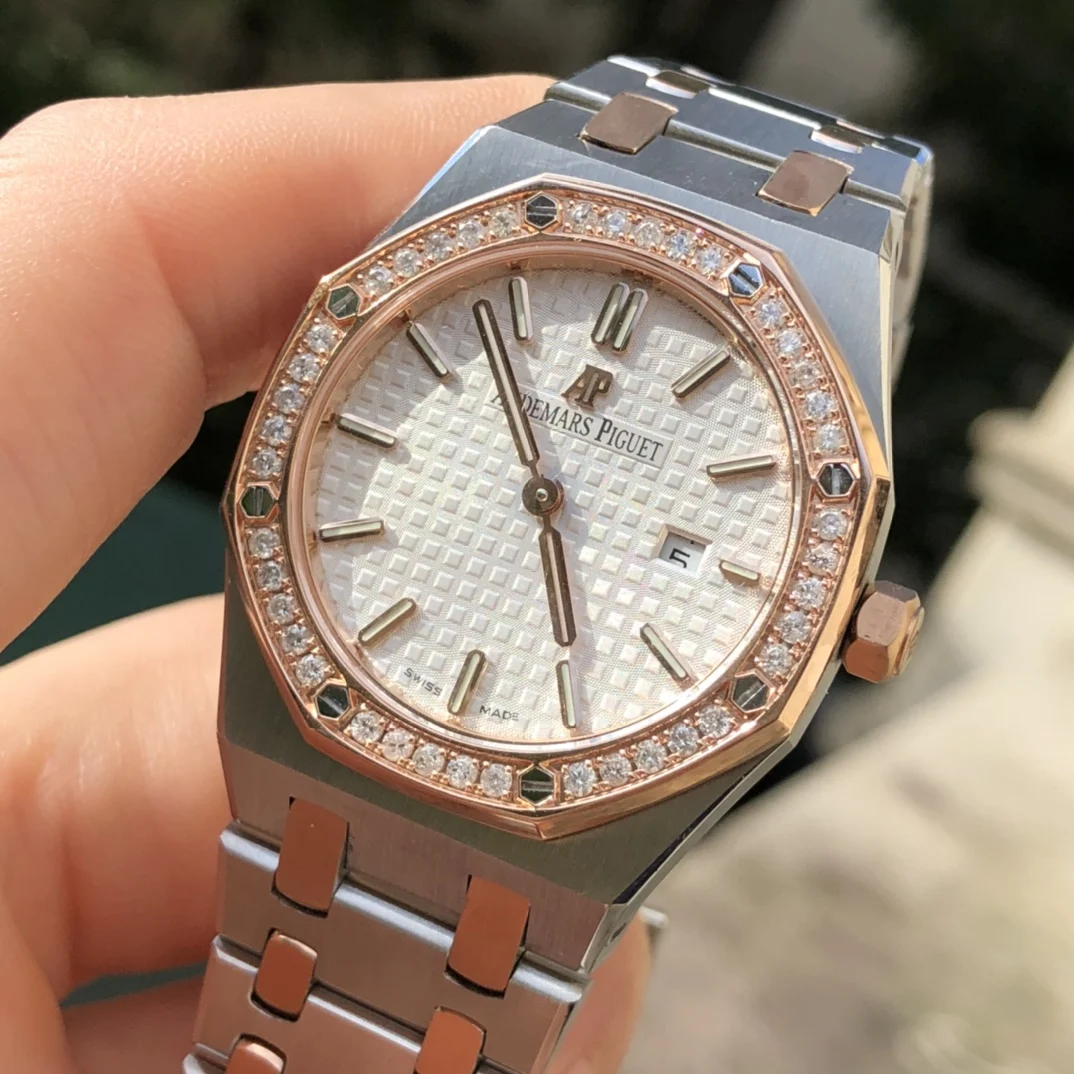 two-tone steel and gold white dial