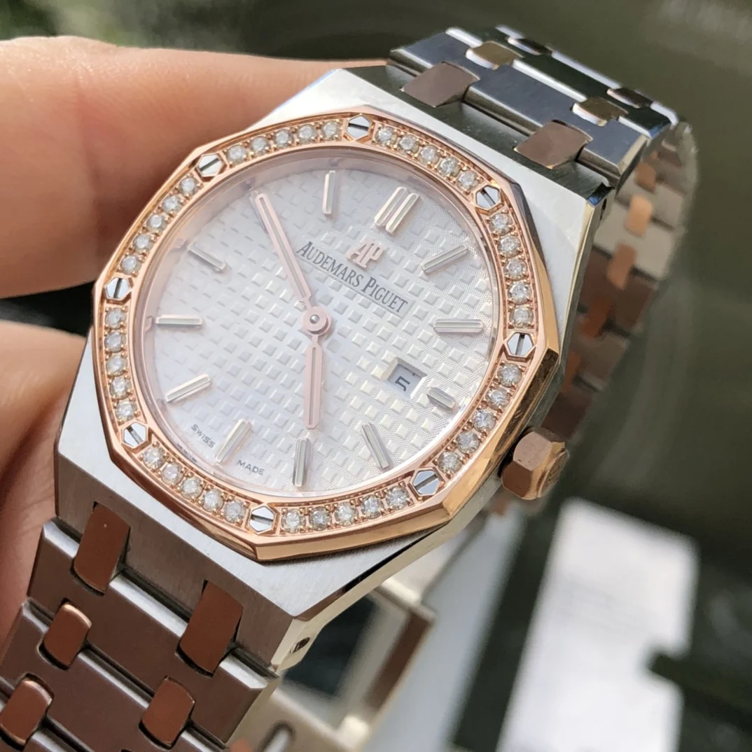 two-tone steel and gold white dial — photographed off the sweep